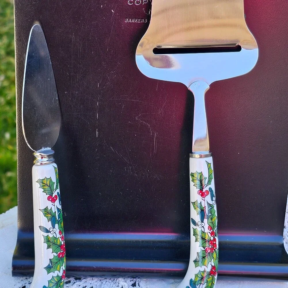 Christmas Sheffield soft cheese spreader and plane stainless w ceramic handles